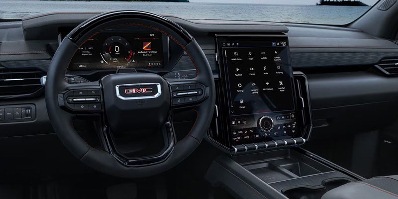 2026 GMC Acadia dashboard with advanced infotainment system and digital displays at Escamilla GMC